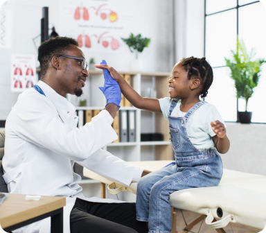 doctor with satisfied child hero image