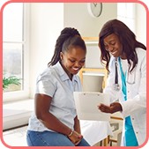 Doctor reviewing care information with a patient